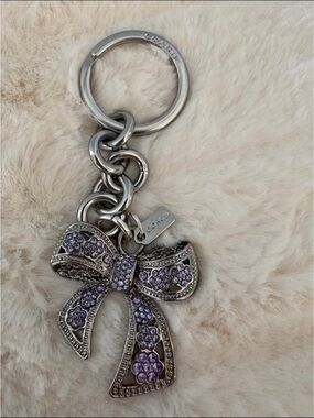 Coach Silver Bow Key Charm with Lavender Crystal Detail